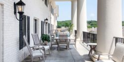 Photograph of the front porch of Grand Village at Clear Creek