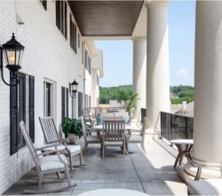 Photograph of the front porch of Grand Village at Clear Creek